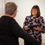 whg colleague talking to customer